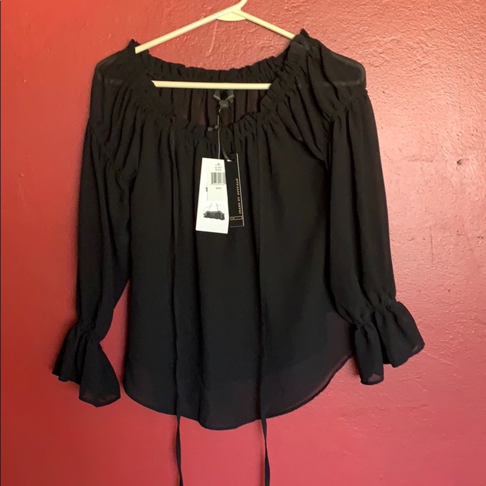 Black off shoulder top.